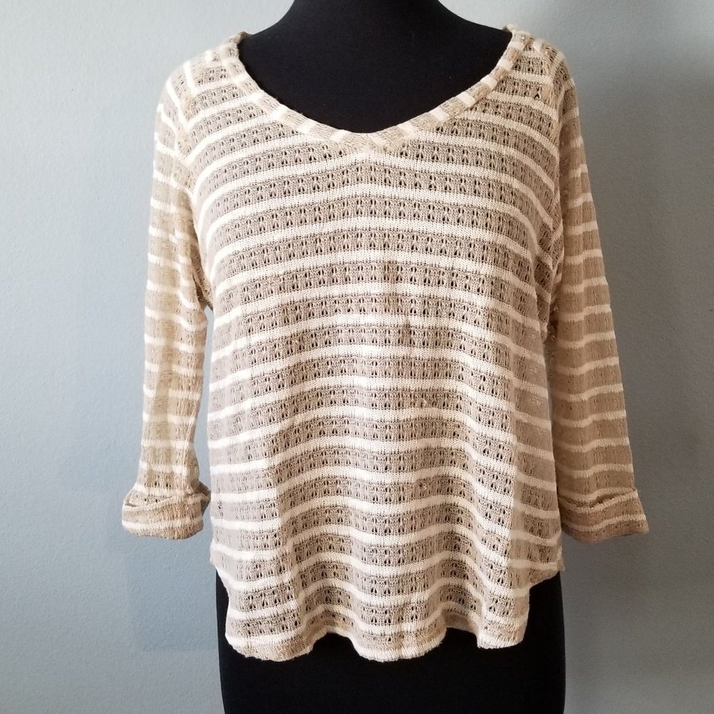 Beige and white knit sweater